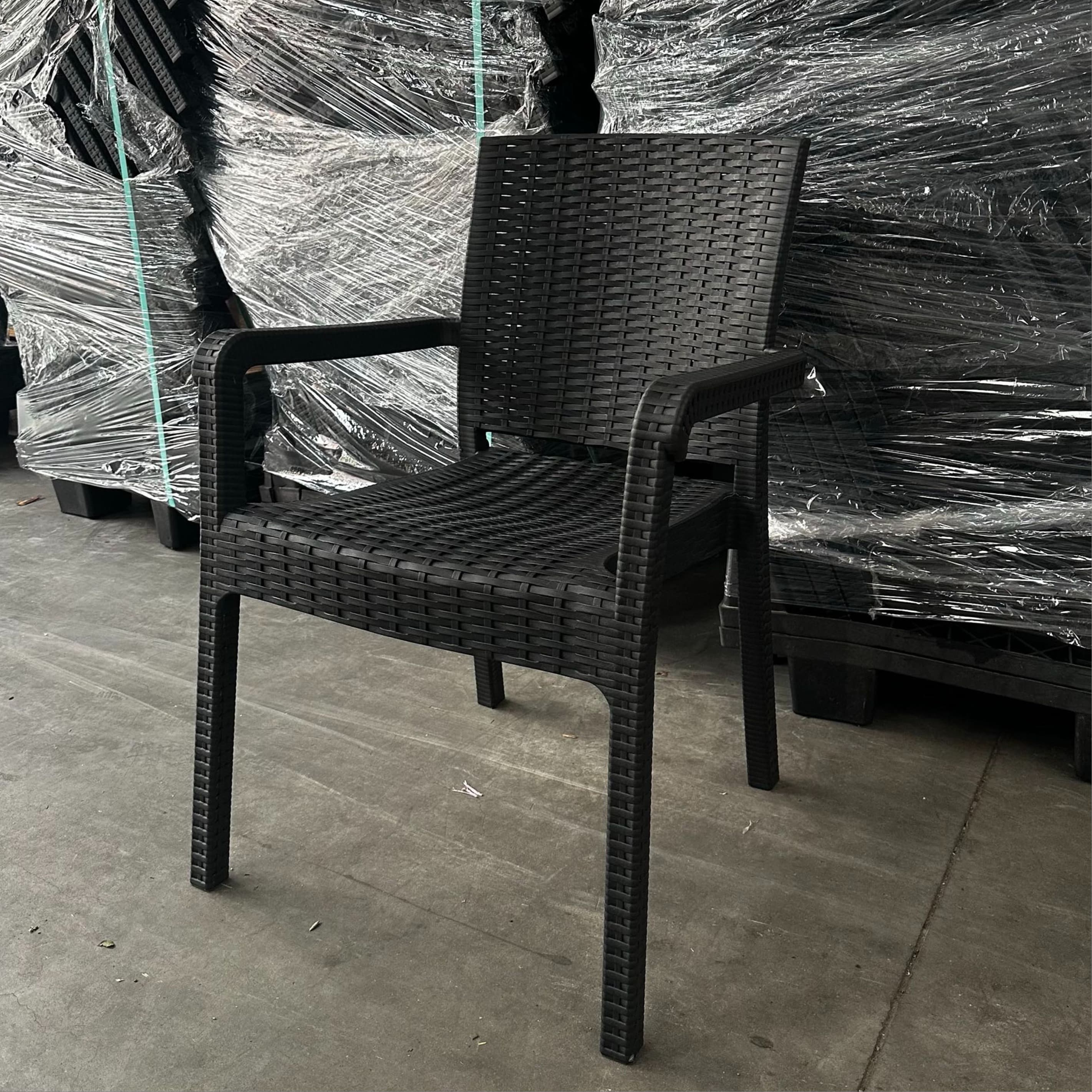 ALEZZO | Stackable outdoor terrace chair in woven‑look plastic – with armrests